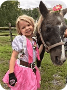 Little Girl Beside a Horse